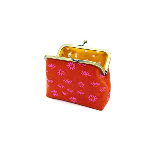 orange clip purse with pink daisies