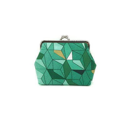 grüne Clipbörse mit grafischem Muster