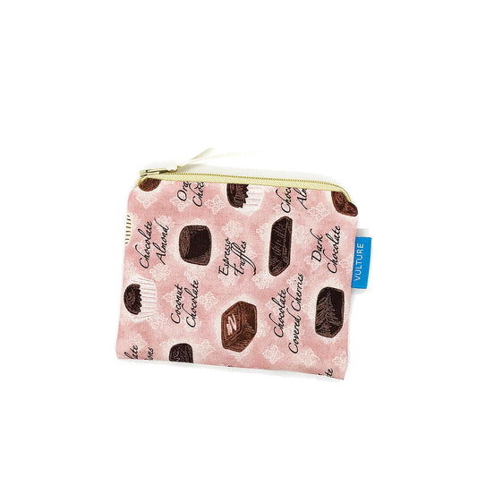 rosa Schminktasche mit Pralinen-Muster